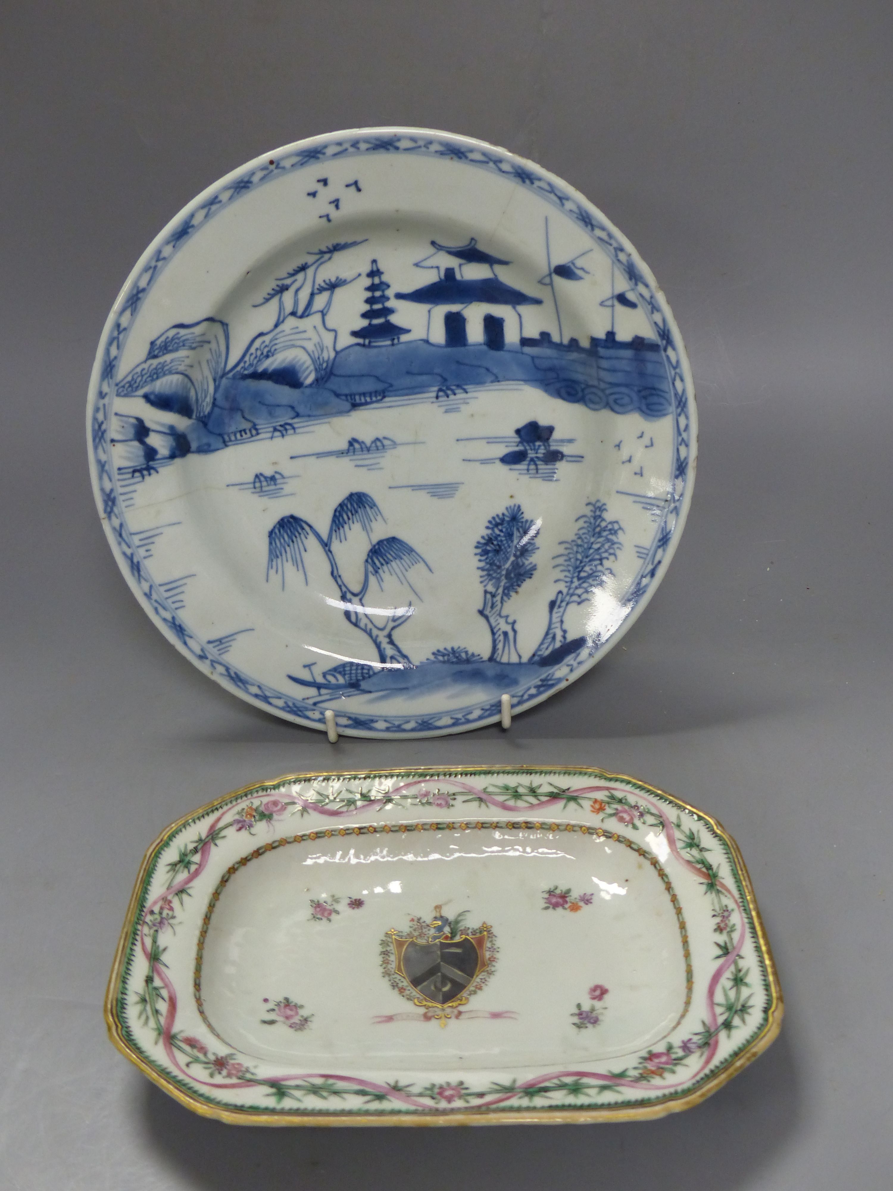A Chinese export armorial dish, of Alexander of Boghall, near Edinburgh, and a Chinese blue and white dish, both Qianlong period, large